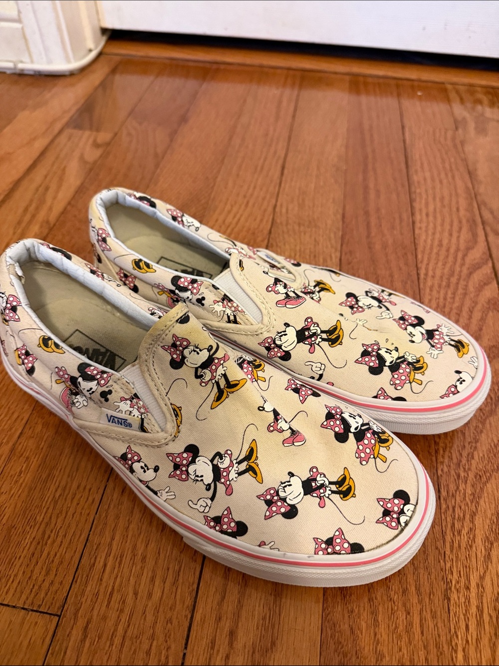 Vans Cream Slip-On Sneakers with Pink and Yellow Minnie Mouse Print Disney